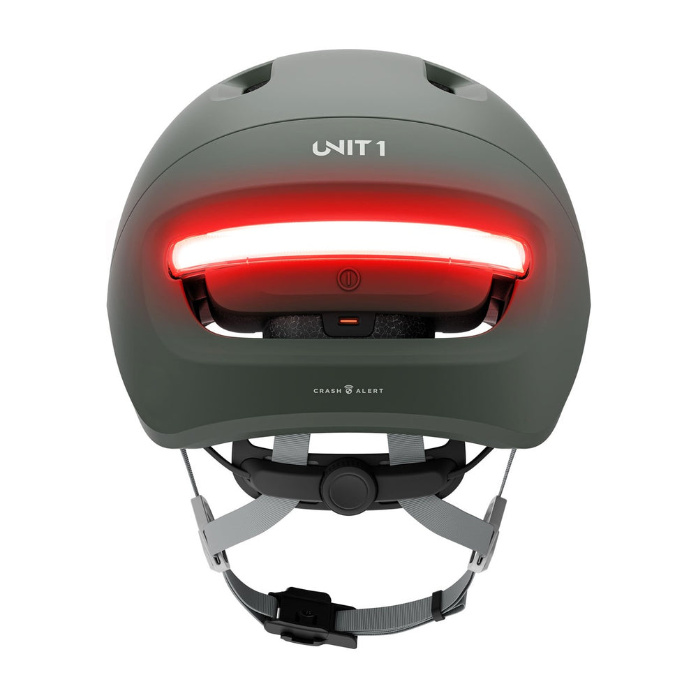 Casque connecté Unit 1 NEON Mips, coloris Pine Green, vue arrière, feu allumé
