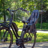 Siège arrière Urban Iki Ta-ke monté sur un vélo de ville