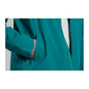 Veste imperméable vélo Basil Skane homme coloris Vert Bleuté - portee capuche relevee